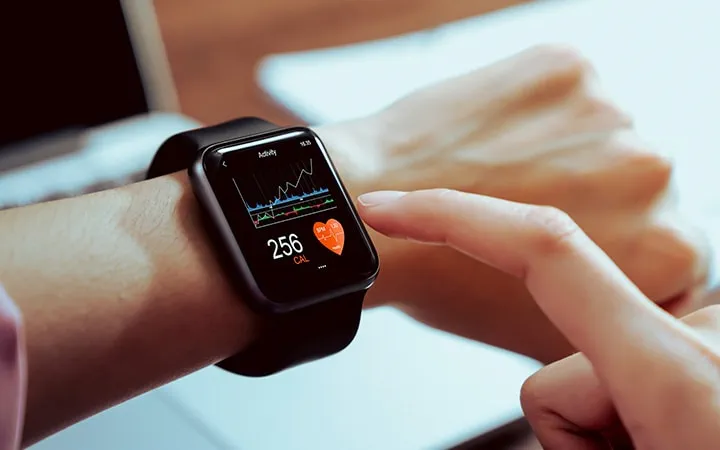 Smartwatch displaying health and fitness tracking metrics